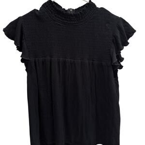 Black top with ruffled sleeves